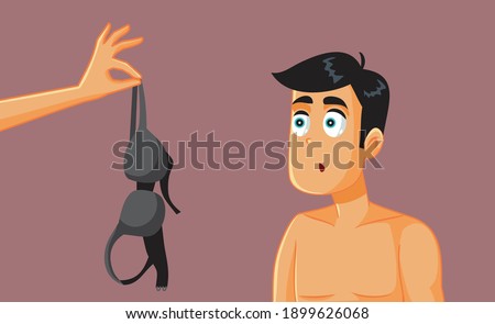 Man Looking at a Bra Ready for Romantic Affair. Girlfriend seducing her boyfriend on Valentine’s day

