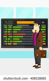 Man looking at schedule board.