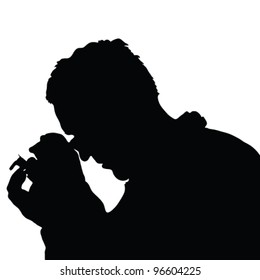 man looking through a magnifying glass on white