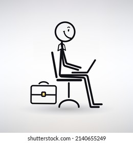 man looks at a computer screen on a light background