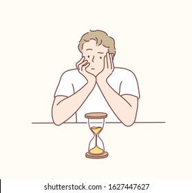 Man looks at the hourglass, thinking, planning and focus in actions. Man worrying about deadline terms. Hand drawn style vector design illustrations.