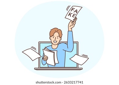 Man looks out laptop screen scattering pieces paper with inscription fake, wanting to mislead people. Metaphor of fake news distributed in social networks and on Internet sites