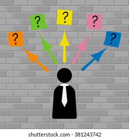 Man looks at the question marks written on adhesive notes stuck to a brick wall