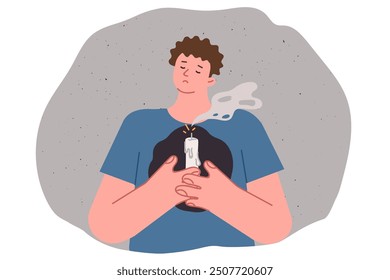 Man lost hope and grieving, feeling devastation or loneliness, holding extinguished candle in front of chest. Guy lost hope due to problems in personal life and betrayal from girlfriend