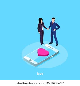 a man in love in a business suit is holding a woman by the hand next to a smartphone on whose screen a heart icon is placed, an isometric image