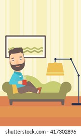 Man lying with cup of tea.