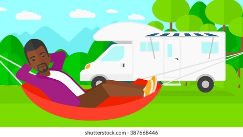 Man lying in hammock.