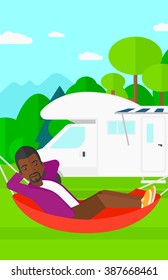 Man lying in hammock.