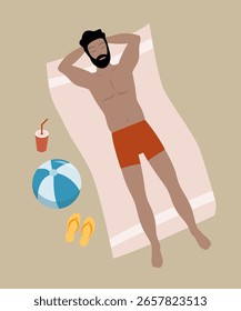 Hombre acostado en la playa tomando el sol.