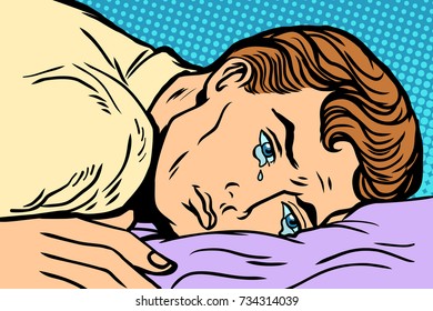 man lying on bed, depression grief and sadness