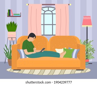 A man lying on the sofa, holding a smartphone. Relaxing at home concept vector flat design. Cheerful man is sitting on couch and is holding phone in hand. Rest time, leisure, free time after work