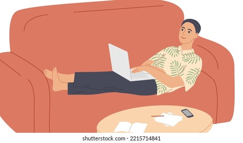 Man lying on the sofa with laptop.