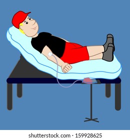 man lying on a stretcher by donating blood
