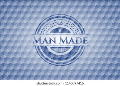 Man Made blue emblem or badge with abstract geometric pattern background.