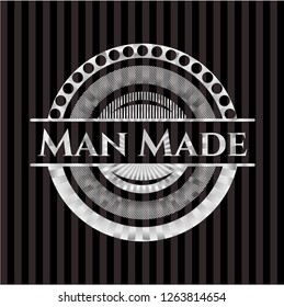 Man Made silvery emblem