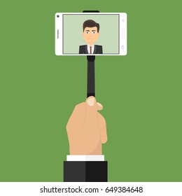 Man makes selfie. A man is taking pictures of himself on the phone. Flat design, vector illustration, vector.