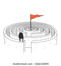 The man in the maze. A man stands in front of the maze.