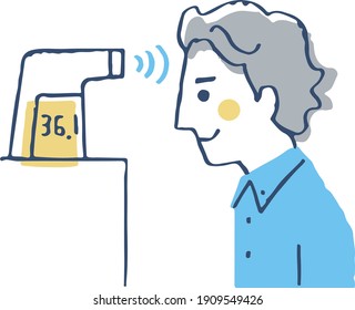 A man measuring temperature with a non-contact thermometer