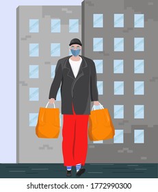 Man in a medical mask on a city street.