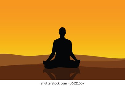 man meditating in a desert