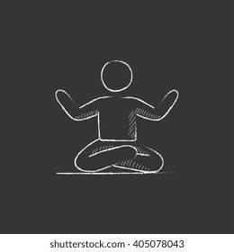 Man meditating in lotus pose. Drawn in chalk icon.