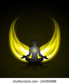man meditation on dark yellow abstract fire background. yoga.