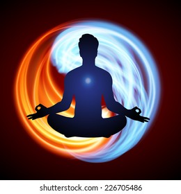 Man meditation on Symbol of yin and yang of background in the form of red and blue fire. 