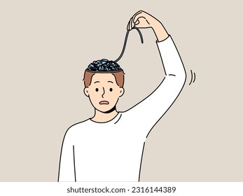 Man with mental problems associated with confusion needs help of psychologist to improve mental health. Young guy is confused trying to unravel threads in brain and looks into camera