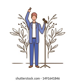 man with microphone and branches and leaves in the background
