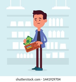 Man with money problems in supermarket