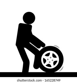 a man moving a tire with his legs