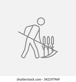 Man mowing grass with a scythe line icon for web, mobile and infographics. Vector dark grey icon isolated on light grey background.