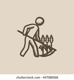 Man mowing grass with scythe vector sketch icon isolated on background. Hand drawn Man mowing grass with scythe icon. Man mowing grass with scythe sketch icon for infographic, website or app.