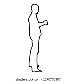 Man with mug standing icon black color