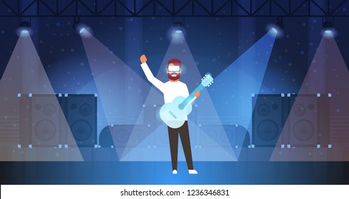 man music guitarist wear digital glasses playing virtual reality guitar on stage light effects disco dance studio vr vision headset innovation concept flat horizontal