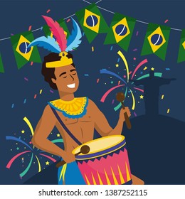 man musician with drum and party brazil banner