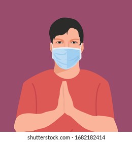 Man with namaste to fight Corona virus (covid-19) with mask