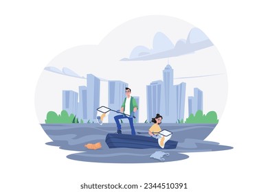 Man With A Net Catches Floating Plastic From The River