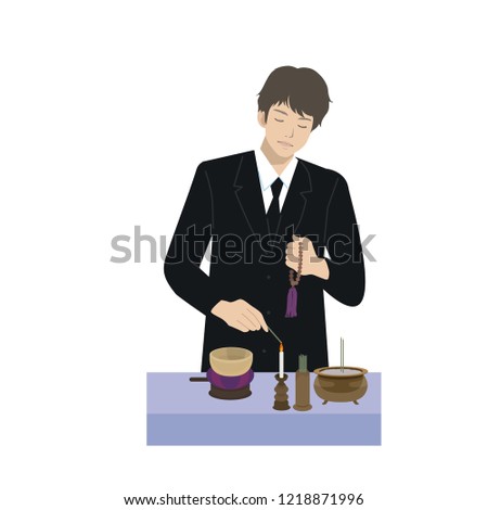 A man offering an incense stick