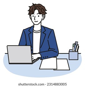 A man in an office casual outfit using a computer