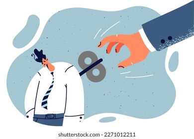 Man office worker is puppet of manager using metal lock to force employee to work. Manager manipulates company employee who is burnt out from overtime and needs rest to recuperate