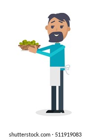 Man with olives isolated on white. Seller propose fresh olives at Spain festival. Flat style design. Best price. Man with beard in white apron sale green olives. Holiday event. Vector illustration
