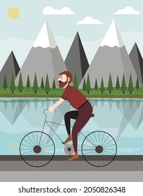 a man on the bicycle rides the mountains 