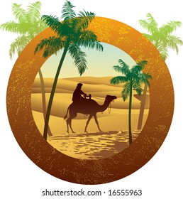 Man on the camel at desert and palm trees