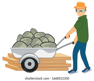 Man on construction site carries stone in pushcart