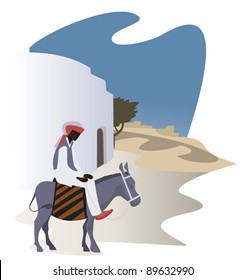 Man on a donkey on the narrow street of the ancient eastern  city
