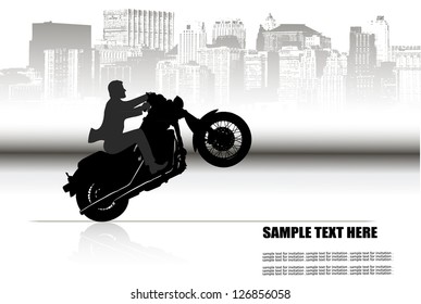 a man on a motorcycle on the background of the city