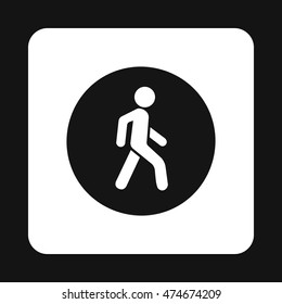 Man on a pedestrian crossing icon in simple style isolated on white background. Rules of the road symbol