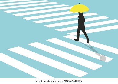 man on pedestrian side walk with yellow umbrella. Concept pedestrians passing a crosswalk. From top view. Shadow at zebra crossing