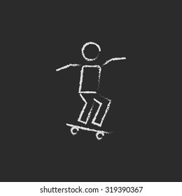Man on skateboard hand drawn in chalk on a blackboard vector white icon isolated on a black background.